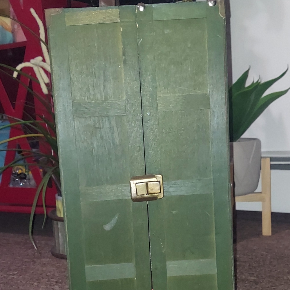 Green Wooden Cabinet with Gold Latch